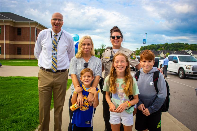 WCS superintendent takes a photo with students